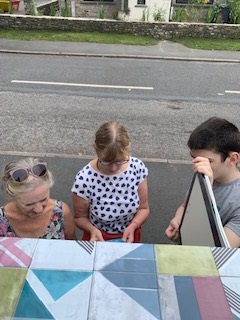 Whinfell Library Box Student With Locals Choosing Books