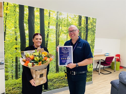 Martyn Receiving Award From Hayley