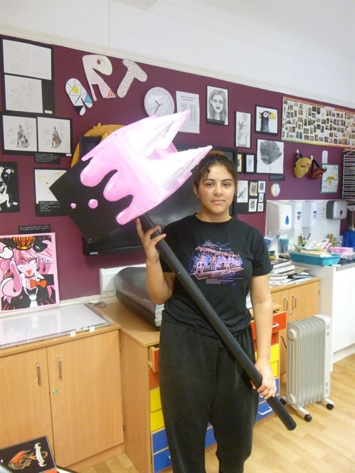 Female Student With Hammer Prop