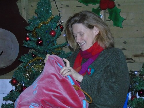 Staff Member With Santa Sack