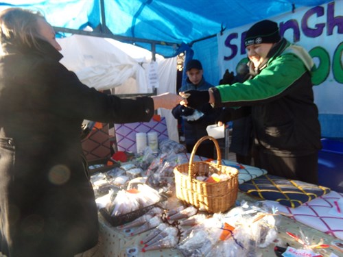 Male Student Working At Stall