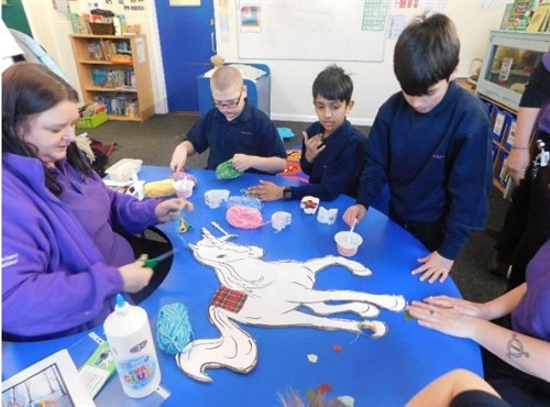 Students And Staff In Art Class