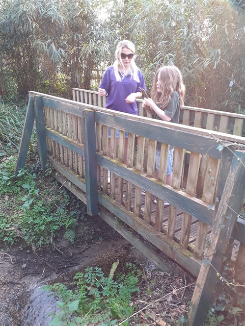 External The Forum School Female Staff Member And Stutent On A Wooden Bridge Web