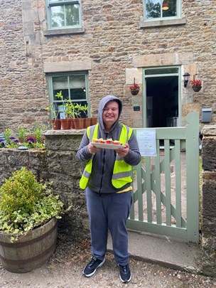 CHOW Young Person With Cakes For Community