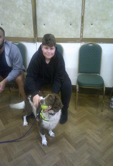 Dog Handling Student Smiling With Sniffer Dog