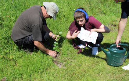 Queens Green Canopy Student And Staff Planting Tree