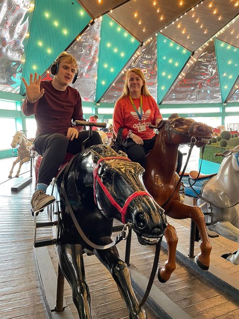 Whinfell Blackpool Trip Students And Staff On Carousel