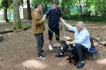 Hill House Walking The Dog Student With Staff