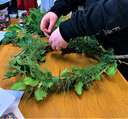 Student Making Biodegradable Wreaths For Christmas