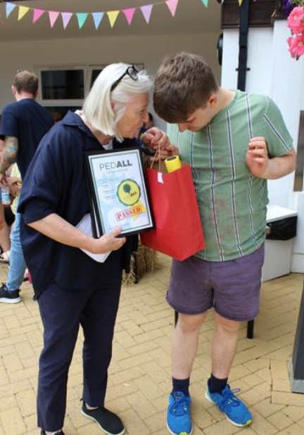 Student With Headteacher And Award