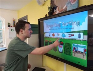 Student Looking At Recycling