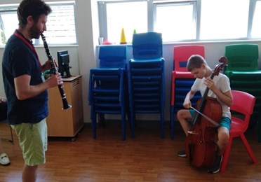 Student Playing The Chello