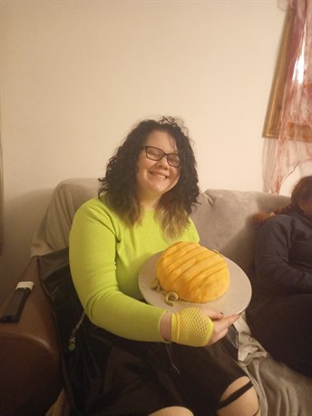 Student With Halloween Cake