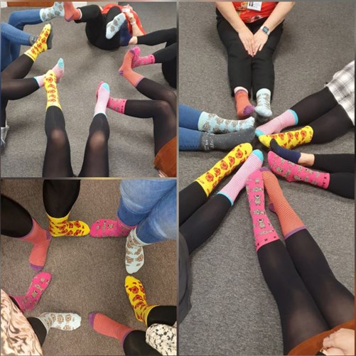 Group Of Female Colleagues With Odd Socks