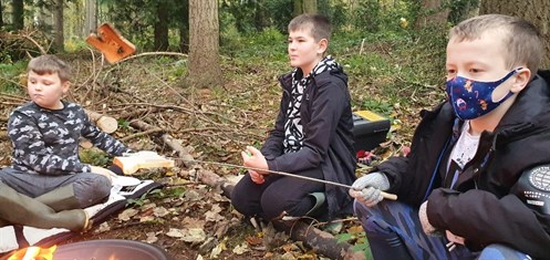 Male Students Toasting Bred