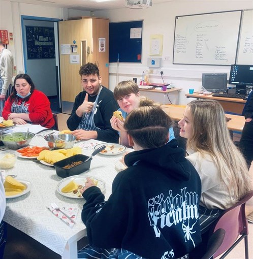 Group Of Students Around Table