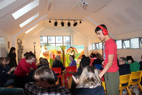 Hill House Student With Earphones In Audience