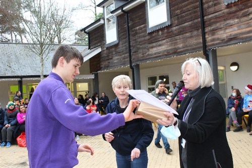 Male Student Being Awarded