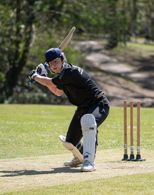 Sam Playing Cricket