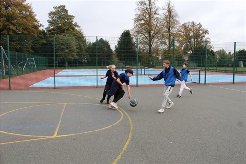 Students Playing Basketball