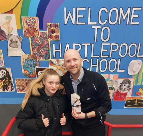 Paul And Female Student With Football Tickets