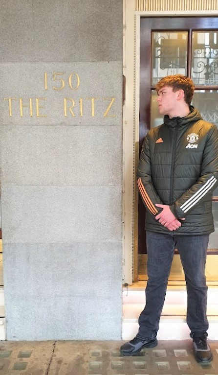 Student At The Ritz Sign