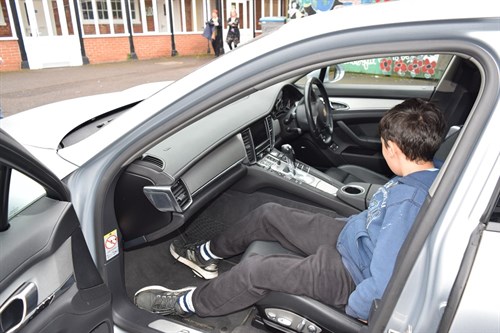 Grateley Student Sits In A Car Outside School