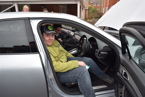 Grateley Student Sits In A Car Smiling At The Camera