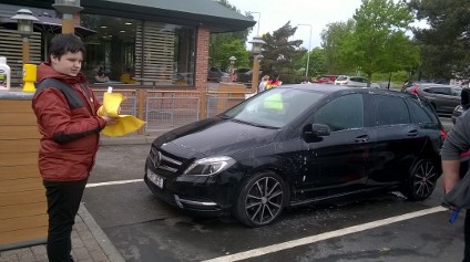 Scarborough Student Admiring Clean Car