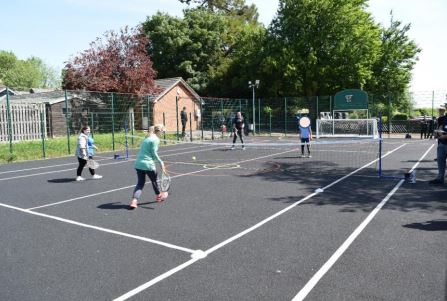 GHS Students Playing Tennis