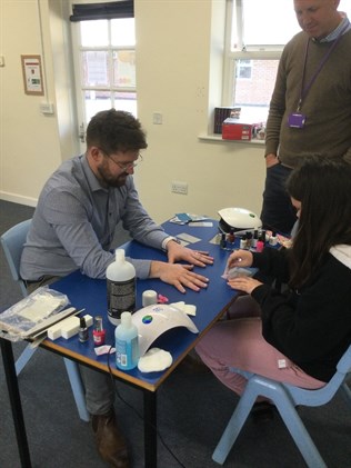 Dan Having Stickers Put On His Gel Nail Varnish