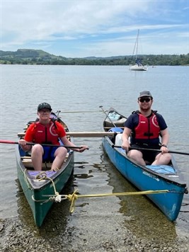 Canoe Camp Students Smiling In Canoes