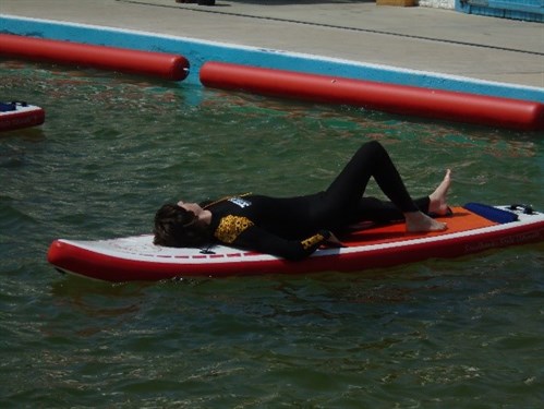 Paddle Boarding Student Resting