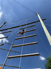 NES NCS Student On High Ropes Challenge