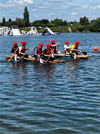 NES NCS Students And Staff Rowing Boat