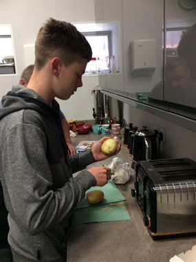 Beverley Cinema Trip Student Peeling Potatoes For KFC Chips