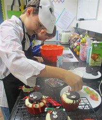 Devon School Halloween Student Baking Cakes