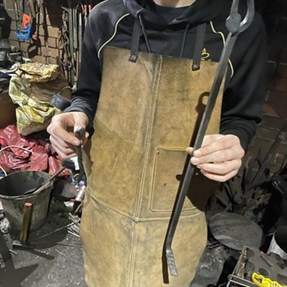 Exploring The Blacksmith World Student With Fire Poker