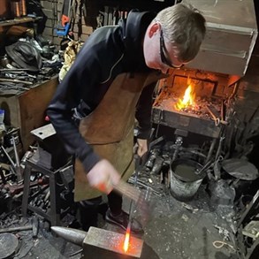 Student Exploring The Blacksmith World