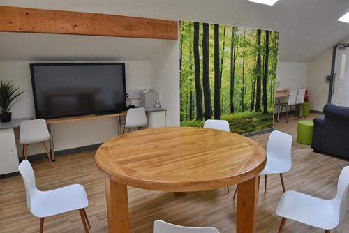Cambian Hill House School Interior Seating Area With Television Table And Chairs