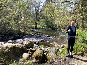 Student By A River
